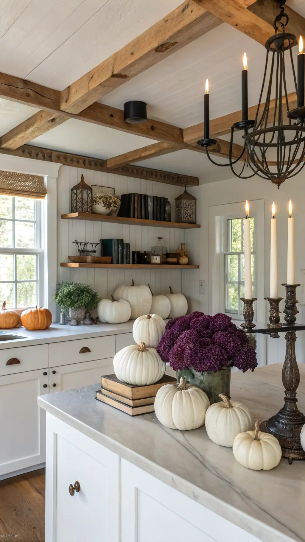 Bright morning light illuminating a rustic farmhouse kitchen with exposed wooden beams, adorned with ghost-white ceramic pumpkins, dark purple hydrangeas, and metallic spell books on open shelves. Vintage brass candlesticks with black candles and macramé spider web decorations add to the spooky vibe. The scene is captured in a wide-angle shot at eye level, showcasing the colors of ivory, aged brass, eggplant purple, and ebony.
